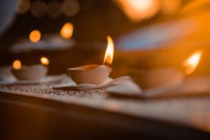 selective focus photography of lighted candles